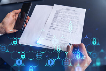 A businessman in formal wear signing the contract to prevent probability of risks in cyber...