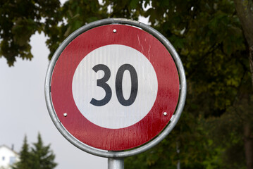 Road sign speed limit 30 kilometers per hour. Photo taken May 17th, 2021, Zurich, Switzerland.