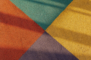Padded floor covering with rubber granules. Special rubber coating for the playground or sports...