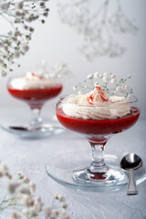 Raspberry-strawberry dessert with cheese cream in verrin