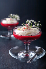 Raspberry-strawberry dessert with cheese cream in verrin
