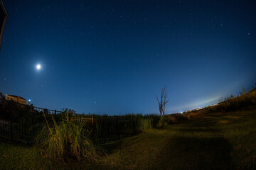 Fototapeta na wymiar Rising moon over Caswell Beach, N.C.