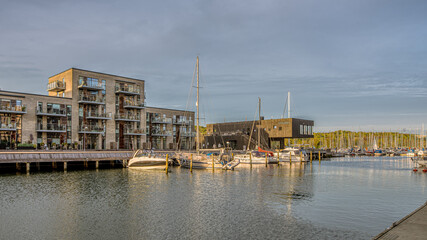 the Vejle marina with modern housing and sailboats