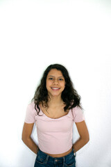 
Girl smiling with pink shirt and white background