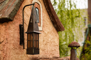 Old style street lamp, antique wrought iron lamp.