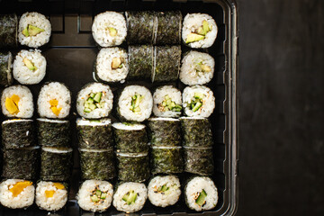 sushi roll seafood maki susi salmon, tuna, rice, nori, wasabi, sesame asian food meal snack copy space food background rustic top view