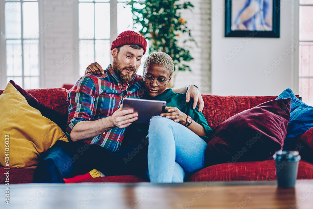 Aufkleber diverse hipster guys hug and reading received email message using home internet connection on modern