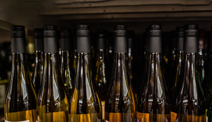 bottles of wine are on the shelves in a large store 