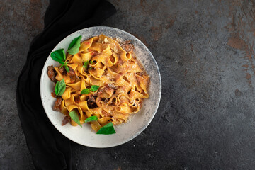 The dish is pasta tagliatelle with bolognese sauce and beef. Traditional Italian pasta with tomato...