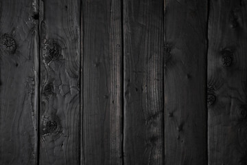Wooden background from burnt boards. Boards burnt according to Japanese firing technology.
