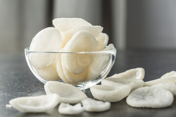 Puffed white snack chips. White potato chips.
