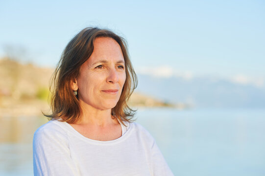 Outdoor Close Up Portrait Of 5 O Year Old Woman Resting By The Lake