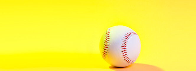 Baseball ball on yellow background. Horizontal sport poster, greeting cards, headers, website. Team sport concept