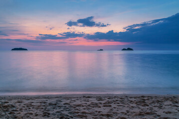Obraz premium Tropical beach at sunset.