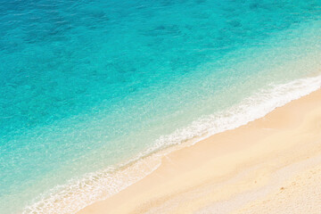 Aerial view of picturesque sea bay with beautiful beach with turquoise water. Summer beach holiday background