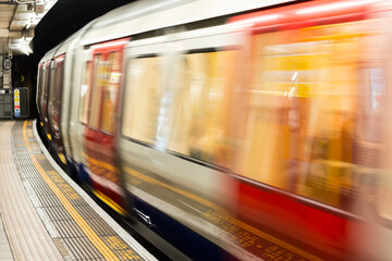 Subway train approaching station, London