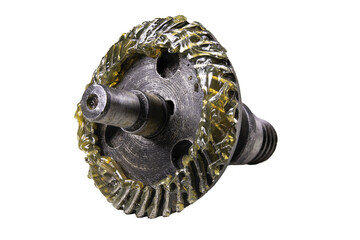 Metal gear wheel coated with machine grease. Spare parts for machines and industrial devices.