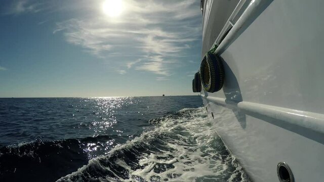 Sea trip travel journey tour on a tourist yacht in the sea ocean. Waves near the sides of the ship.