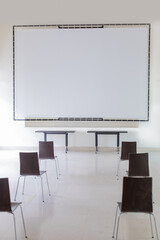 empty conference room with large board