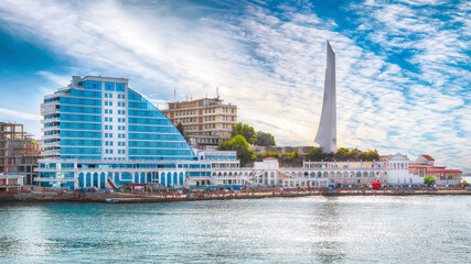 Residential complex Cape Khrustalny and the obelisk to the Hero City of Sevastopol during sunny day.