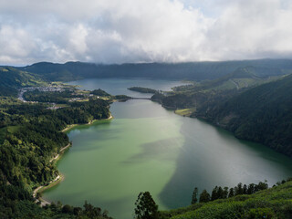 Fototapeta na wymiar Nature landscape paradise. Azores, european holiday travel destinations. Drone aerial view of volcanic landscape. Sao Miguel island with amazing lagoons from above