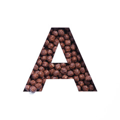 Letter A of alphabet of chocolate cereal balls, white cut paper. Typeface for healthy breakfast packaging design