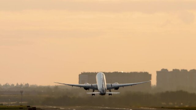 Take off at dawn, morning plane flight