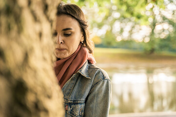 Portrait of a beautiful young woman outdoors in the city. Urban landscape. Travel and freelance lifestyle. Youth and beauty