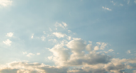 Naklejka na ściany i meble Blue sky background with white clouds, high clouds. Altostratus, Cirrocumulus, Cirrus.