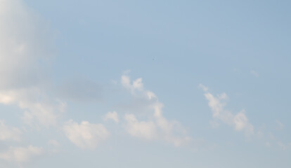 blue sky background with white clouds bright sunny day