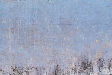 Textura de muro azul manchada con humedad