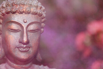 Buddha Statue in Outdoor Garden With Blurred Background