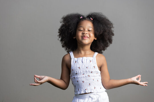 Childhood And Emotion Concept - Little African American Curly Hair Girl  Dancing Hiphop.body Positivity Concept.