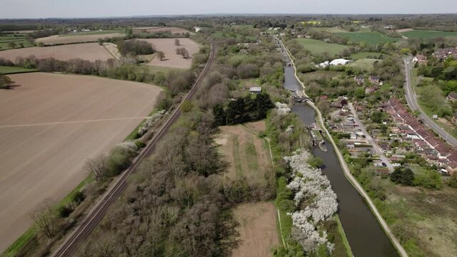 Hatton Locks Narrow Boat In Canal And Train On Railway Line Spring Season Aerial View Grand Union London Northwestern