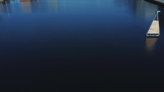 Flyover Grand Canal and docks revealing apartment blocks, offices and Bord Gais theatre.