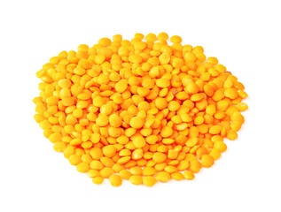 pile of hulled red lentils closeup on white