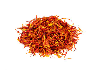 Fototapeta premium pile of dried safflower petals closeup on white