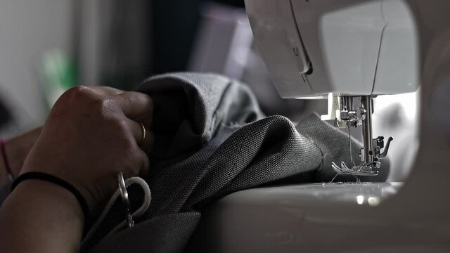 Seamstress clothes designer sewing machine