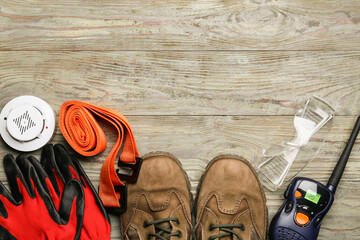 Safety equipment on wooden background
