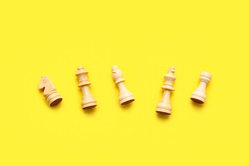 Chess pieces on color background