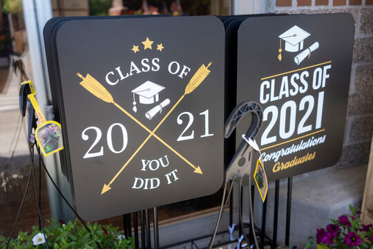 Lake Oswego, OR, USA - May 16, 2021:  Graduation yard signs are seen for sale in a supermarket in Lake Oswego, Oregon.