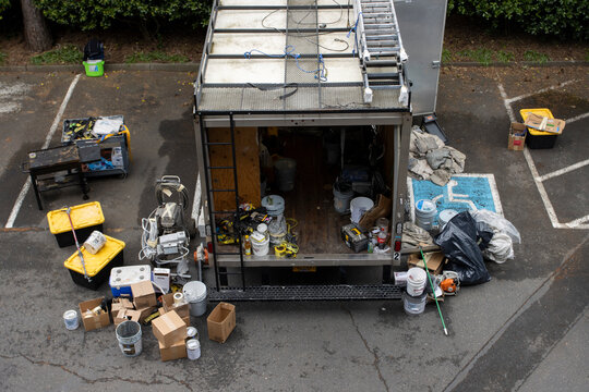 Lake Oswego, OR, USA - May 4, 2021: An unloaded painting company truck in a neighborhood parking lot in Lake Oswego, Oregon.