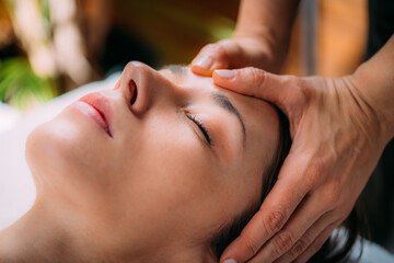 Obraz na płótnie Canvas Craniosacral Therapy Head Massage for Pain and Migraine Relief.