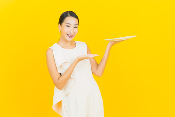Portrait beautiful young asian woman smile with empty plate dish - 434241456