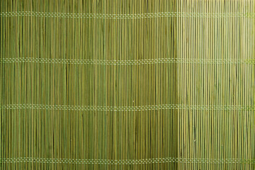 Green bamboo mat texture. Top view.