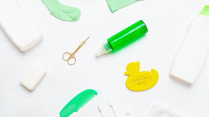 Eco friendly lavender baby bath care products on a white background. shampoo bottle, hair balm. flat lay.