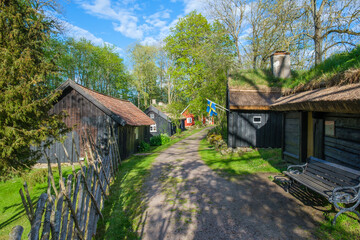 Old settlement with log house at Åsle tå in Sweden