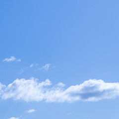 Background of blue sky with white clouds