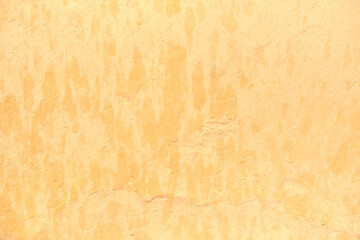 Muro amarillo texturizado manchado
