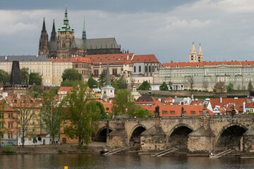 Naklejka premium Sunset cloudy view of Prague with the Prague Castle, Czechia